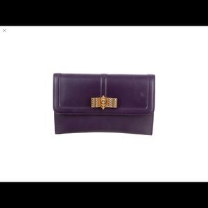 Christian Louboutin Clutch. Sweet charity clutch.